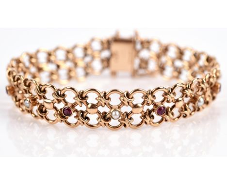 Vintage ruby and pearl bracelet, fancy openwork bracelet set with seed pearls and round cut rubies, in 9 ct hallmarked Birmin