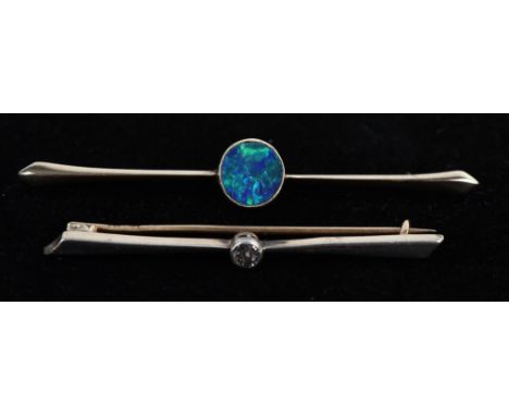 Two bar brooches, one set with an opal in stamped 9 ct, 6cm in length the other set with an old cut diamond in 9 ct, 5cm in l