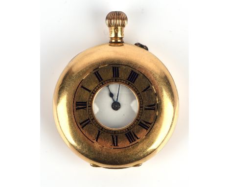 18 ct gold half hunter pocket watch  the unsigned white enamel dial with Roman numeral hour markers,steel hands fitted with a