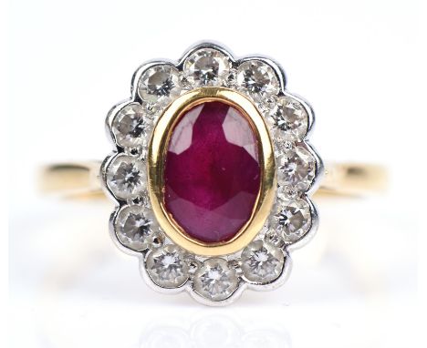 Ruby and diamond ring, set with an oval cut ruby, surrounded by round brilliant cut diamonds, in 18 ct, ring size NCondition 