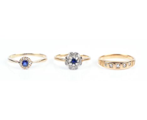 Three rings, including an antique diamond five stone ring, size K, a sapphire and diamond cluster ring, size H, both in 18 ct