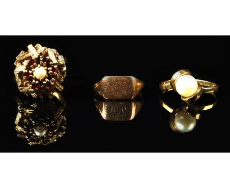 Three 9 ct rings, including a vintage pearl and garnet floral dress ring, with central pearl and surround of round cut garnet