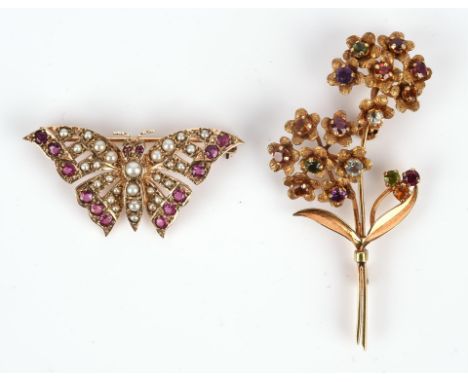 Two vintage brooches including a gem set flower brooch stamped 18 ct, measuring 59 x 27mm, together with a ruby and pearl but