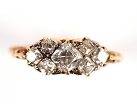 Early 19th C diamond ring, set with five Peruzzi cut diamonds, one old cut and one square mixed cut diamond, with scrolled un