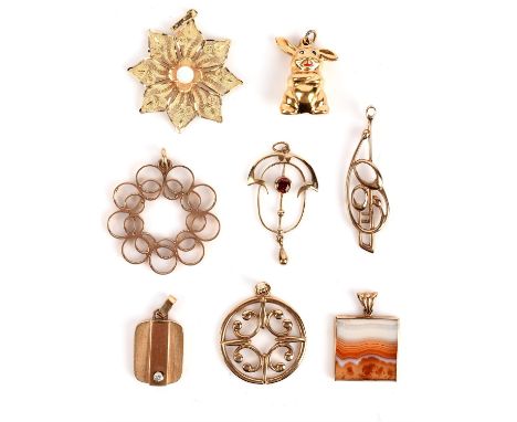 A selection of pendants, including a square agate pendant, a spiral pendant, a rectangular pendant set with a round brilliant