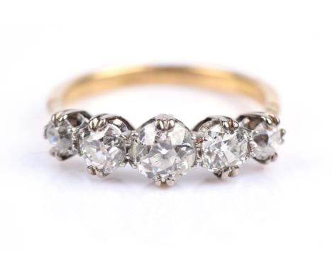 An antique five stone diamond ring, old cut diamonds, weighing an estimated total of 1.70 carat, claw set in stamped 18 ct, r