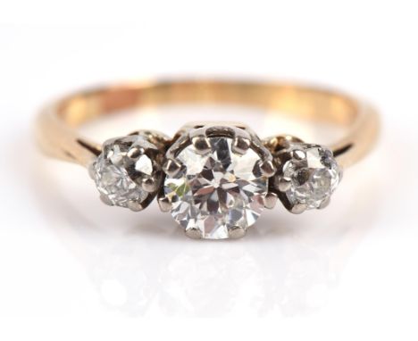 Three stone ring, set with old cut diamonds with a total estimated weight of 0.87 carats, all claw set in tested 18 ct, size 