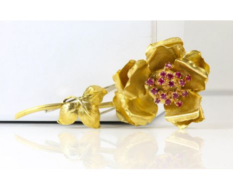 Late 1930's Rose en tremblant brooch, set with 16 round cut ruby articulated stamen, estimated total ruby weight 1.28 carats,