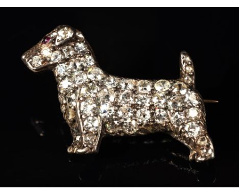 Diamond Sealyham terrier brooch, set with old and rose cut diamonds, estimated total diamond weight 0.85 carats, with ruby ey