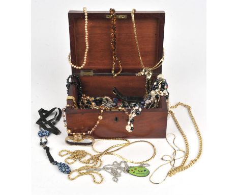 A wooden jewellery box containing costume jewellery, including Murano glass graduated bead necklace, faux pearl necklaces, a 