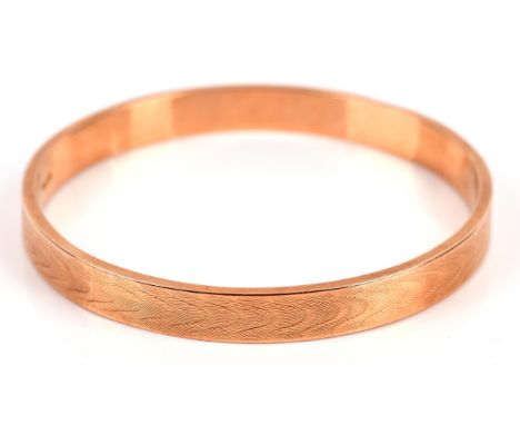 1920's flapper girl bangle, 8.5mm wide fixed bangle with wave design to outer edge, 73mm inside diameter, in 15 ct with maker