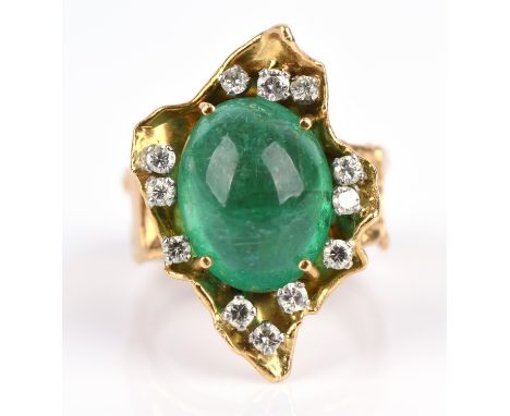 George Weil vintage emerald dress ring, central oval cabochon cut emerald estimated weight 13.02 carats, set in an abstract d