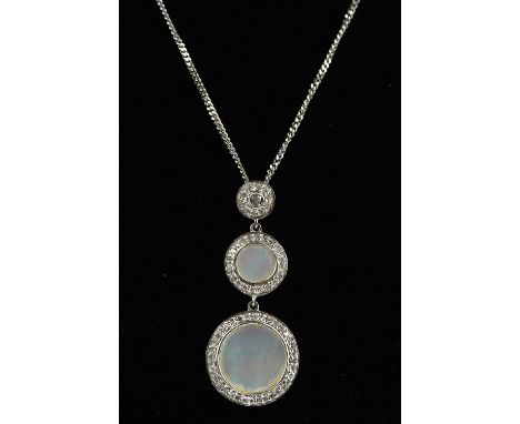 Mother of pearl and diamond necklace, designed as two circular discs of mother of pearl, surrounded by diamonds and a diamond