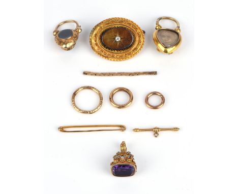 A selection of antique jewellery including a wirework brooch centrally set with a diamond, with a glazed panel to the reverse