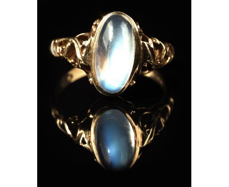 Vintage moonstone ring, oval cabochon cut moonstone weighing an estimated 2.61 carats, bezel set with openwork shoulders, in 