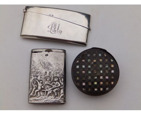 A monogrammed Birmingham silver card case, an 830 standard continental vesta and a circular tortoiseshell snuff box. (3)