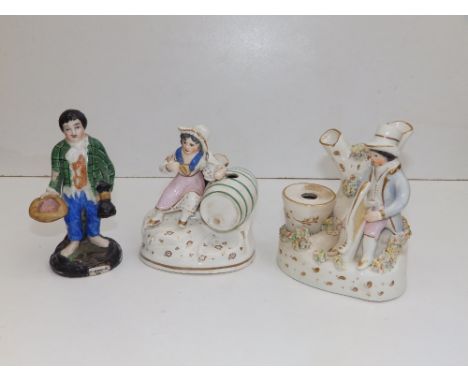 A  19thC Staffordshire figural inkwell with man playing a harp,  bearing paper label inscribed 'Old Derby', 4.5" high and two
