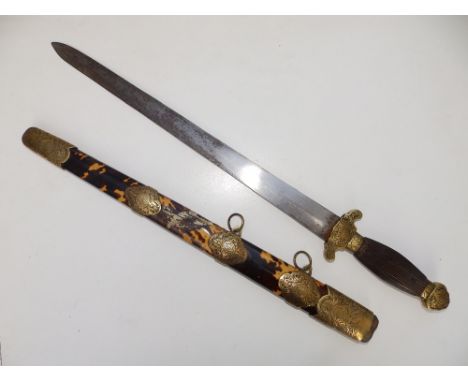A Chinese dagger with 15.5" blade in wooden scabbard veneered in tortoiseshell and mounted in brass - some veneer missing.