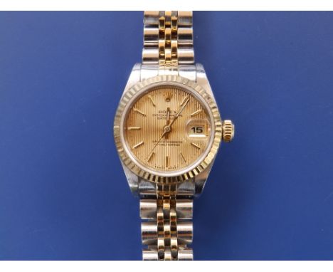 A boxed  lady's bi-metal Rolex Oyster Perpetual Datejust Superlative Chronometer wrist watch with tag and two booklets.
