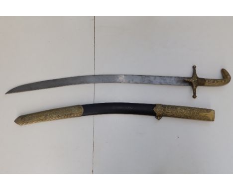 A 20thC Eastern sword with decorative brass hilt and mounts to leather covered scabbard,  24" blade.