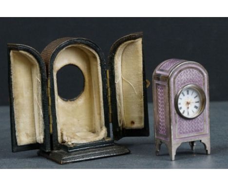 A French hallmarked silver and lilac guilloche enamel miniature clock in original display case. 