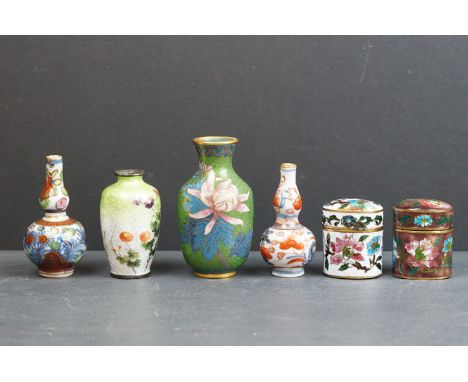 A collection of two oriental cloisonné enamel trinket boxes together with four miniature vases.