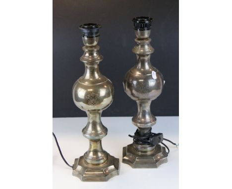 Pair of modern silver plated lamp bases by Shivom, labelled to underside, each with pseudo crest to knop stem, approx. 42cm h