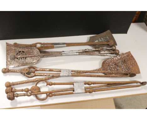 Group of fireside tools, to include shovels, tongs and pokers 