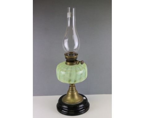 Antique oil lamp with uranium well 