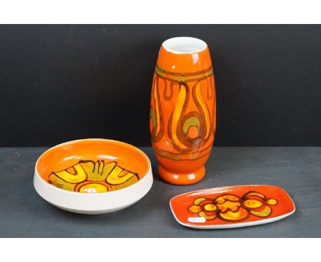 Three items of Poole ' Delphis ' Pottery on orange grounds including Vase, Bowl and Pin Tray 