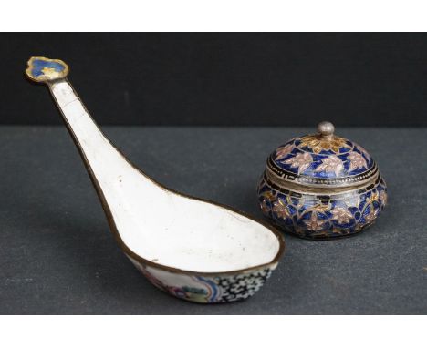 An antique oriental cloisonne enamel spoon together with a white metal and enamel pill box. 