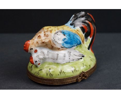 A 19th century enamel trinket box in the form of a Cockerel and Hen 