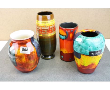 A collection of four Poole pottery vases to include a Concave example. 