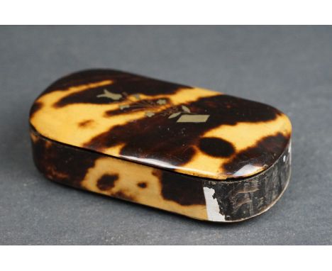 An antique tortoiseshell snuff box with inlay decoration. 
