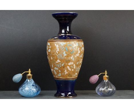 Royal Doulton Stoneware Baluster Vase with a band of gilt floral decoration on a blue ground, 33.5cms together with Two Caith