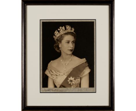 Wilding, Dorothy Queen Elizabeth II portrait of Queen Elizabeth II as a young woman, mounted on tissue and signed by the phot