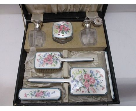 A mid 20th century engine turned, enamelled, silver and clear glass dressing table set, Adie Brothers, Birmingham 1947, decor