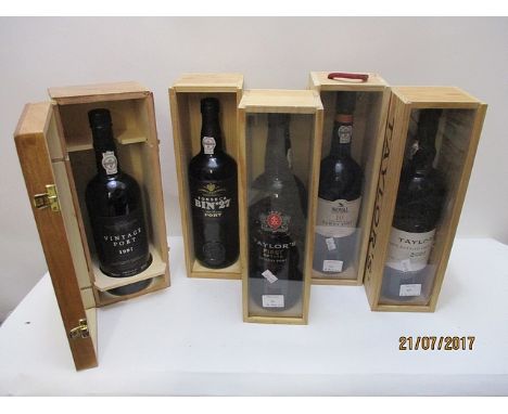 A bottle of Taylor's First Estate Reserve Port, a bottle of Noval 10-year old Tawny Port, a bottle of Fonseca Fine Reserve Bi