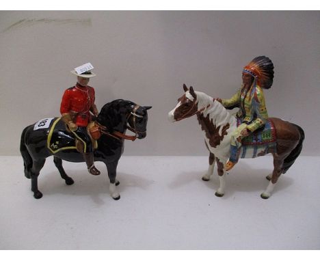 A Beswick model of a red Indian mounted on horse-back, along with a model of a Canadian mounted policeman on horse-back