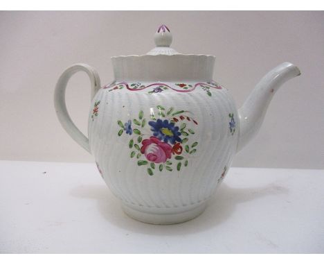 A late 18th century pearlware teapot of bulbous wrythen moulded form with a domed lid, decorated with flowers in pink, blue a