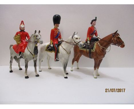 Three Beswick model horses and riders to include HM Queen Elizabeth II mounted on Imperial, 10 1/2 h, HRH The Duke of Edinbur