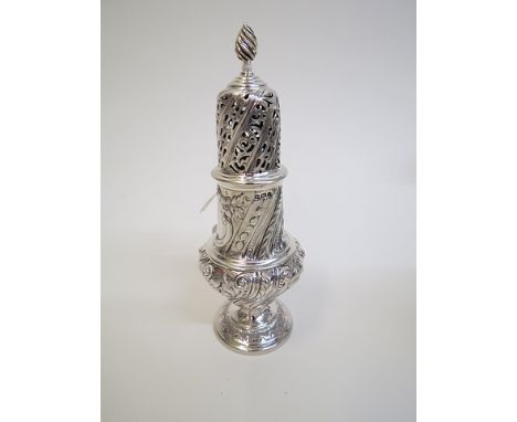 A Victorian silver sugar castor, Sheffield 1890, with a flamed finial and scrolled decoration on a raised, circular base, 7 h
