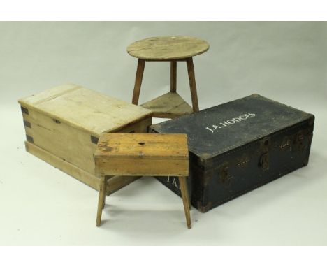 A 19th Century pine cricket table of typical form, a pine trestle stool, pine tack box, a school type trunk inscribed "J.A. H