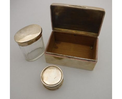 An Edwardian silver cigarette box of plain rectangular form (by William Neal, Chester 1908), 14 cm long, together with a silv