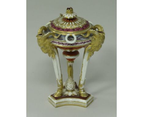 An early Derby pot pourri, the lid with stylised floral finial and gilt decoration above three ram's head masks, raised on ho