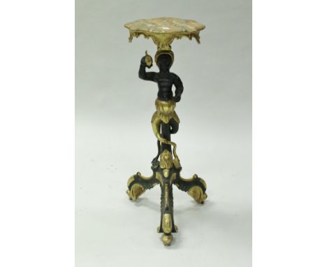 A painted and gilded figural torchere in the 18th Century Venetian taste, the top with simulated marble decoration on a black