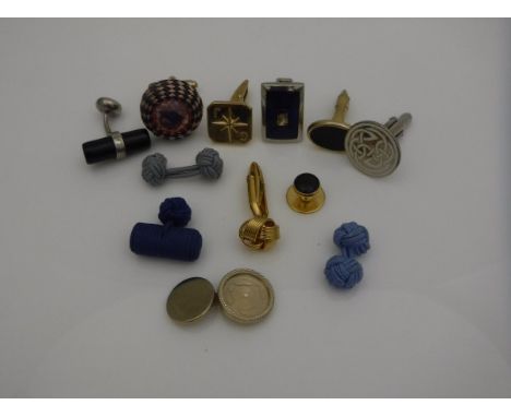 A collection of cufflinks to include a pair of 9 carat gold cufflinks the front set with stars and initialled JG, various sil