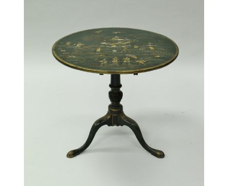 A 19th Century green lacquered and chinoiserie decorated tea table, the circular snap top decorated with figures in a garden 