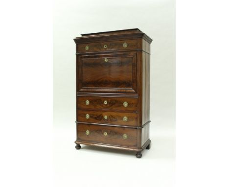 A circa 1900 mahogany secrétaire à abbatant in the Biedermeier taste, the caddy top over a single drawer and full front compa