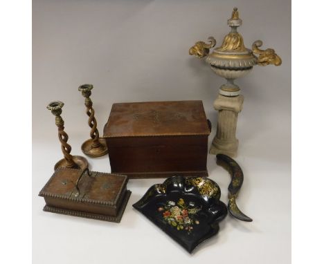 A collection of various treen ware to include a pair of open barley-twist candlesticks, an oak cigarette box, an oak lidded b